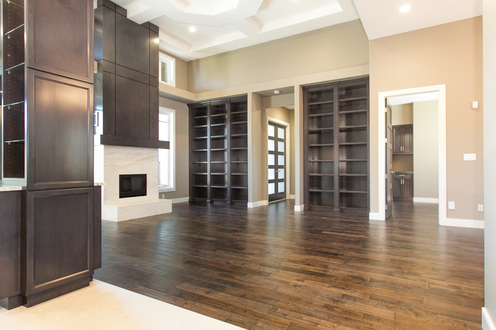 Example of a transitional home design design in Edmonton