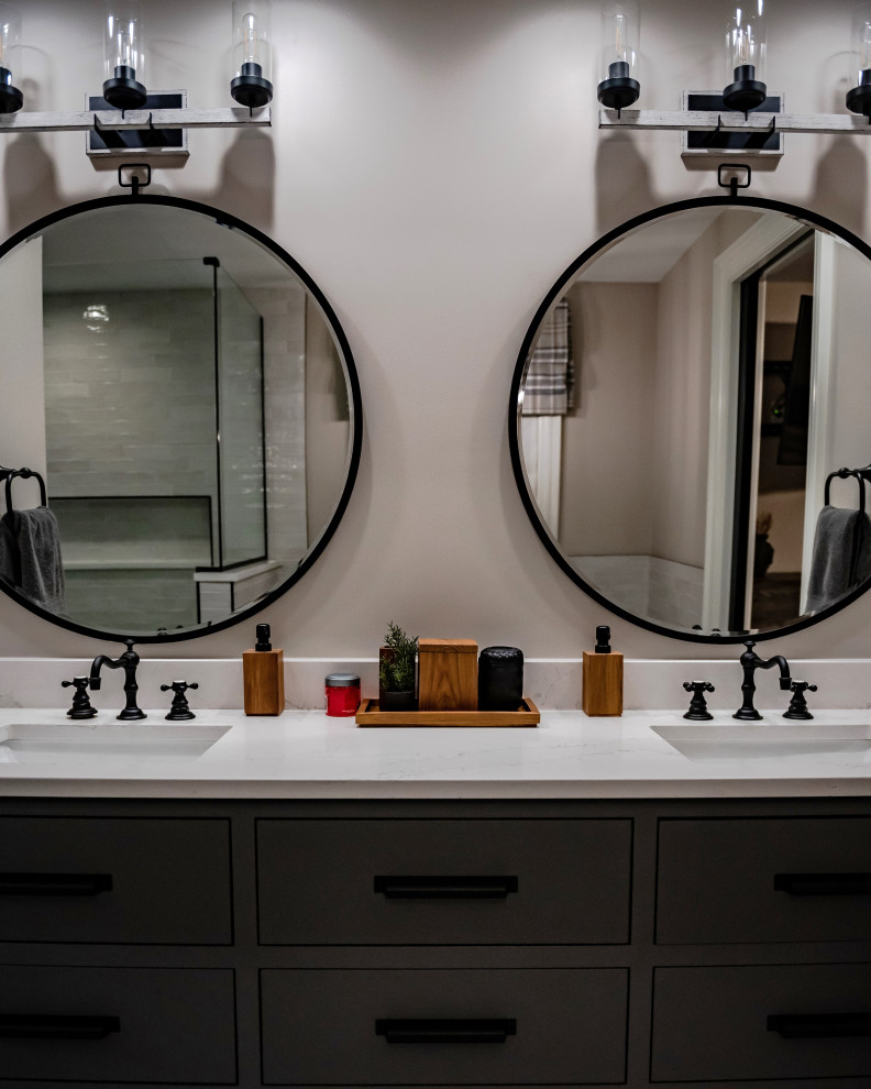Country bathroom in Columbus with flat-panel cabinets, grey cabinets, a freestanding tub, a double shower, a one-piece toilet, a drop-in sink, engineered quartz benchtops, a hinged shower door, white benchtops, a double vanity and a built-in vanity.