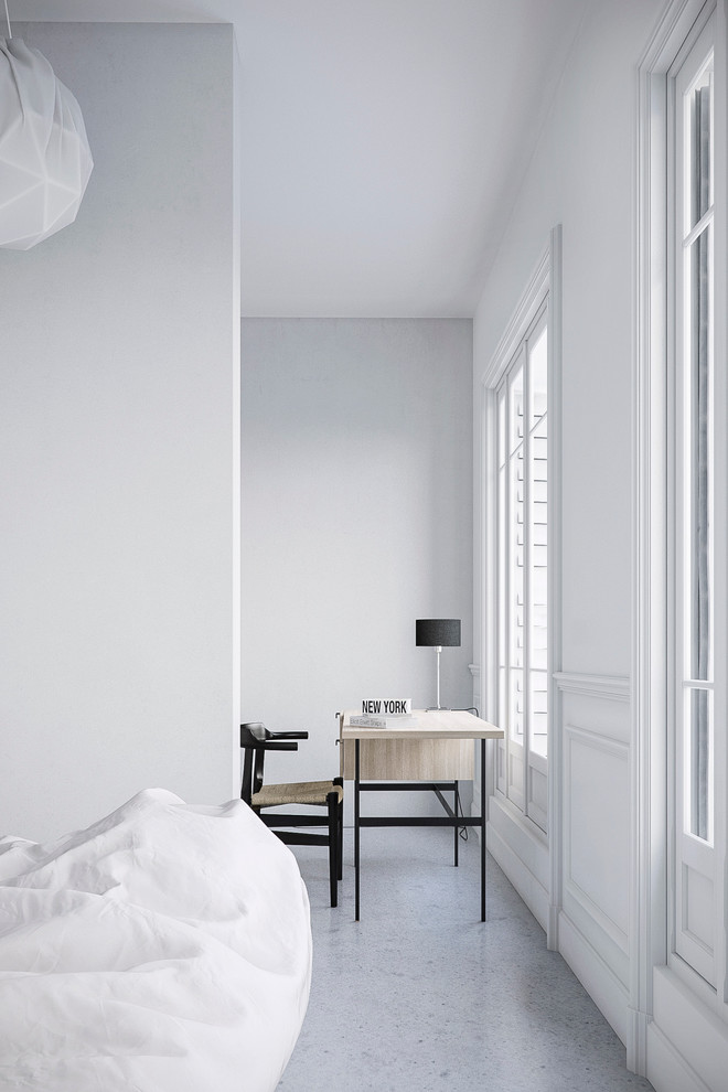 Mid-sized transitional study room in Paris with white walls and a freestanding desk.