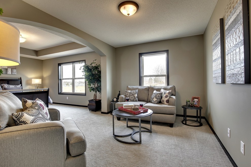 Design ideas for a large traditional master bedroom in Minneapolis with grey walls, carpet and grey floor.