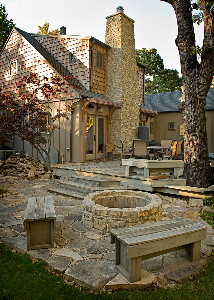 Deck - mid-sized rustic backyard deck idea with a fire pit