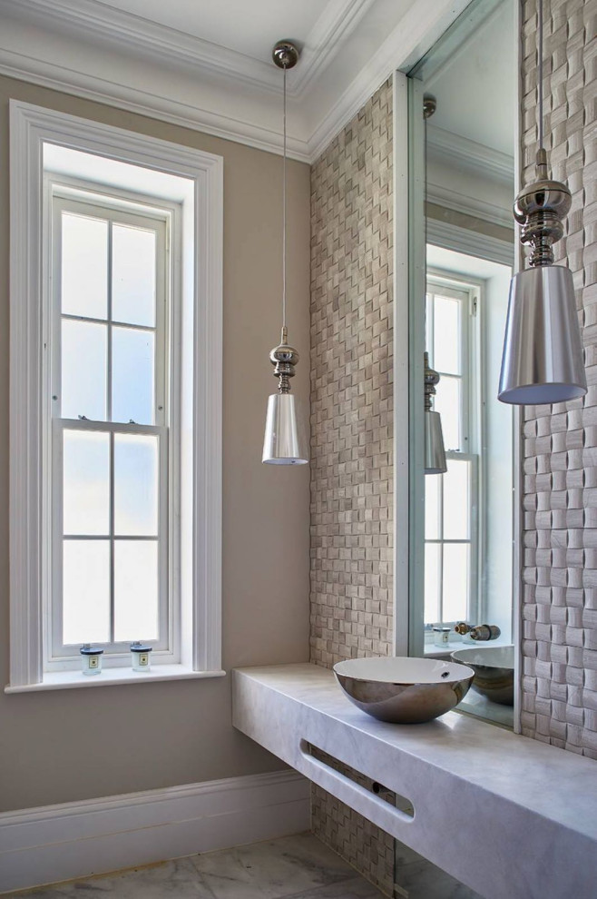 Inspiration for a large contemporary powder room in Essex with gray tile, limestone, grey walls, marble floors, a vessel sink, marble benchtops, grey floor and grey benchtops.