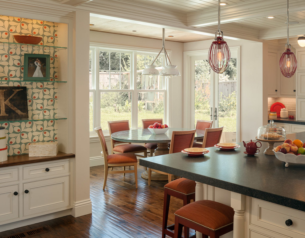 Kitchen - transitional medium tone wood floor kitchen idea in San Francisco with a farmhouse sink, beaded inset cabinets, white cabinets, granite countertops, blue backsplash, ceramic backsplash and an island