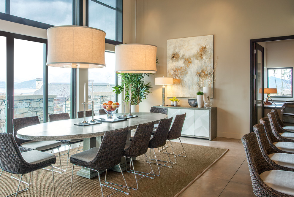 This is an example of a mid-sized contemporary dining room in Salt Lake City with white walls and concrete floors.