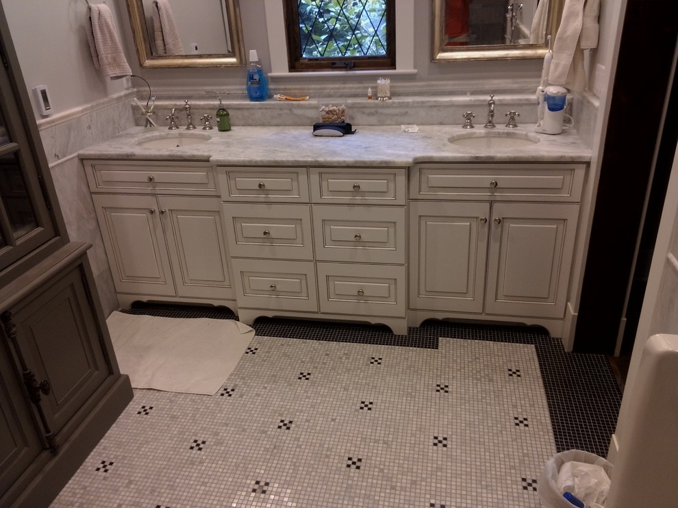 Inspiration for a large transitional master bathroom in Detroit with raised-panel cabinets, grey cabinets, grey walls, mosaic tile floors, an undermount sink, marble benchtops and multi-coloured floor.