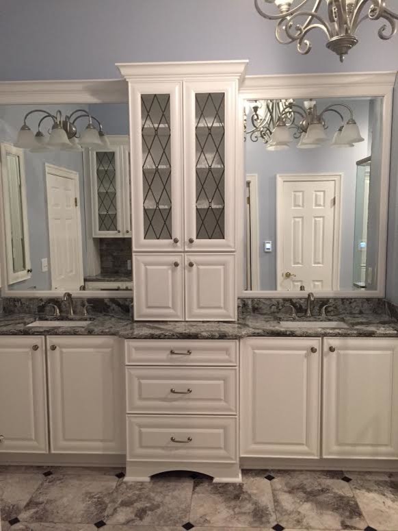 Inspiration for a mid-sized traditional master bathroom in Other with an undermount sink, raised-panel cabinets, white cabinets, engineered quartz benchtops, an undermount tub, a corner shower, a two-piece toilet, gray tile, stone tile, blue walls and marble floors.
