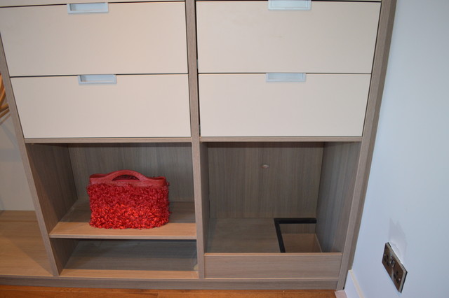 Walk In Wardrobe With Laundry Chute On The Right Contemporary