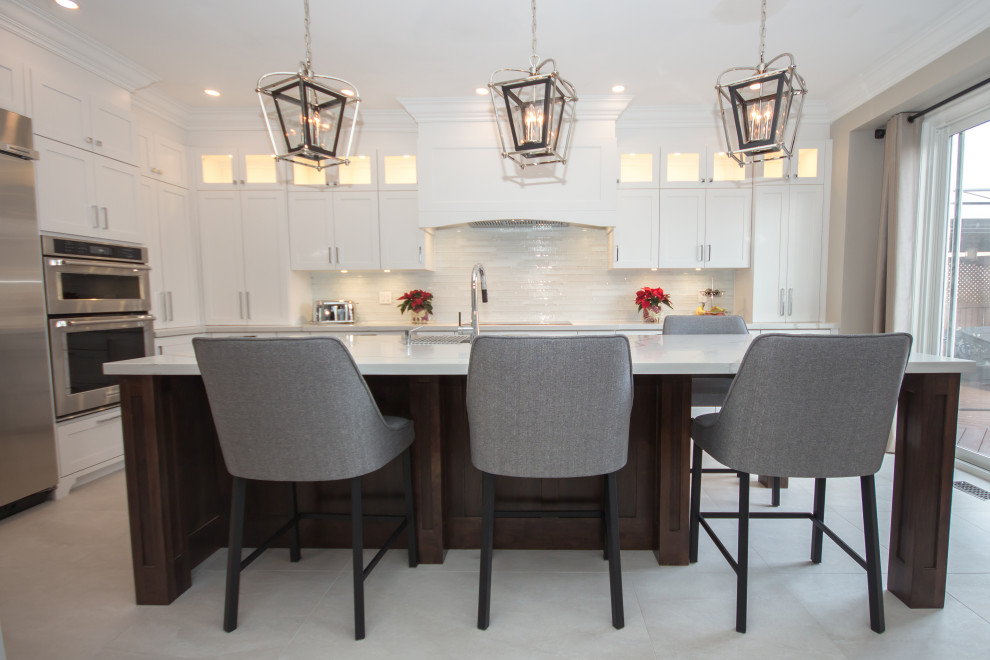 Example of a transitional kitchen design in Toronto