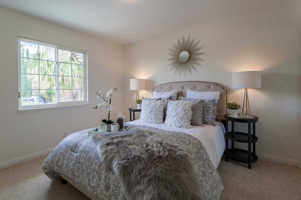 Design ideas for a mid-sized transitional master bedroom in Los Angeles with white walls, carpet and beige floor.