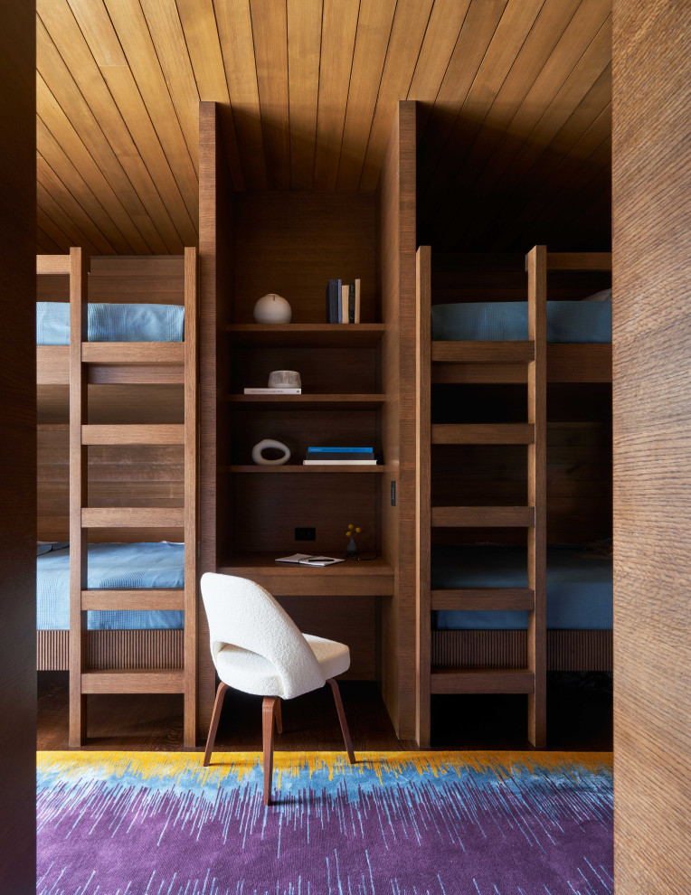 На фото: огромная нейтральная детская в стиле модернизм с спальным местом, коричневыми стенами, ковровым покрытием, разноцветным полом и деревянным потолком для подростка с