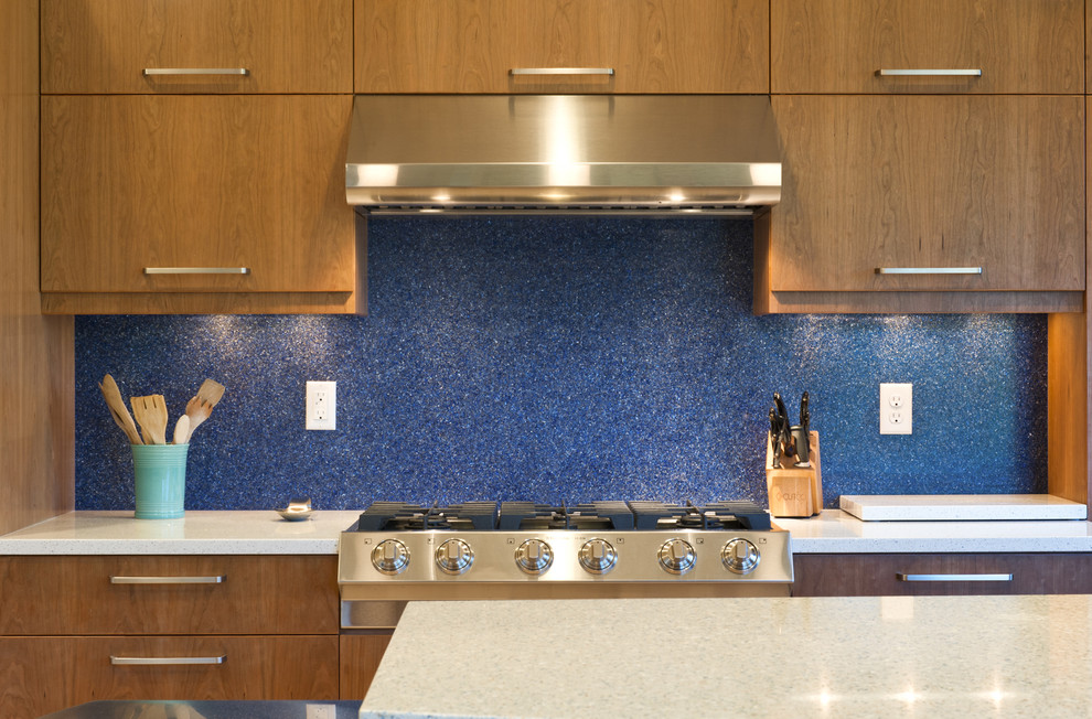 This is an example of a modern kitchen in Portland with stainless steel appliances.