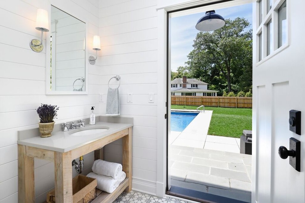 Modern Farmhouse - Powder room - farmhouse powder room idea in Chicago with open cabinets, light wood cabinets, white walls and an undermount sink