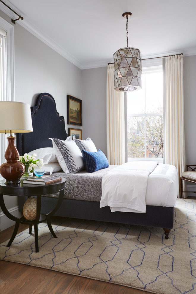 Mid-sized transitional master bedroom in Boston with grey walls and dark hardwood floors.