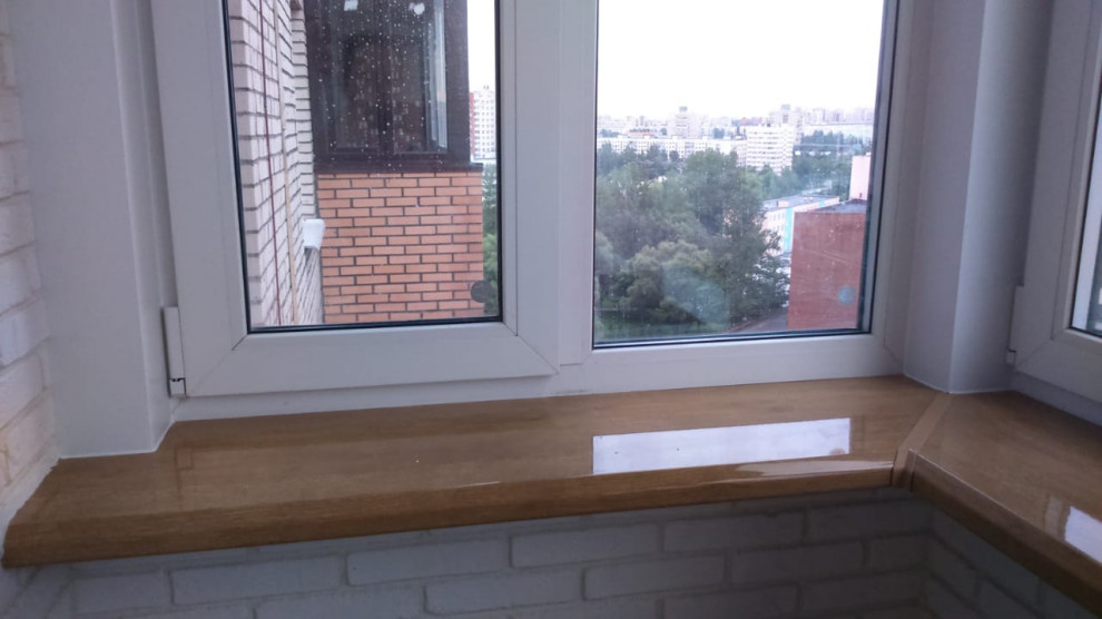 Замена остекления, утепление и отделка балкона декоративным камнем