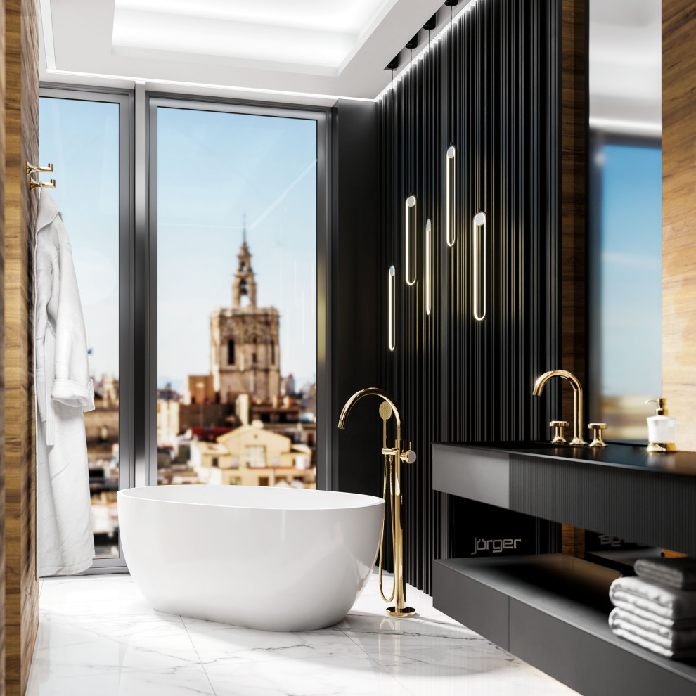 Idéer för ett svart badrum, med svarta skåp, ett fristående badkar, brun kakel, marmorgolv, ett integrerad handfat och vitt golv