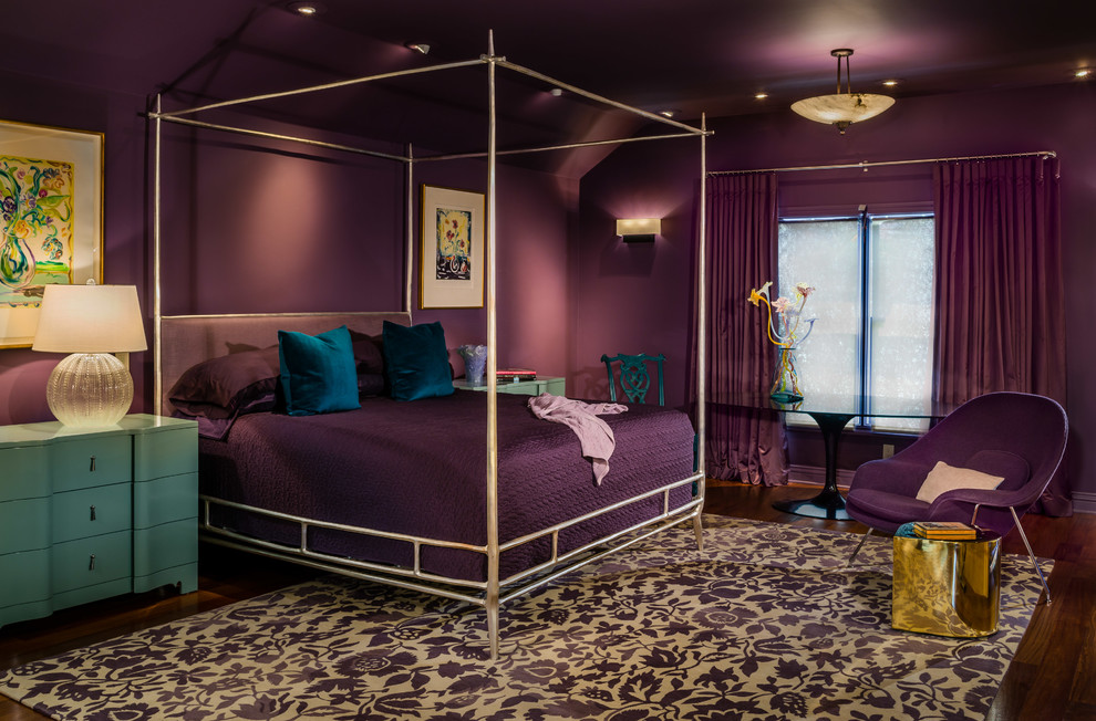 This is an example of a contemporary master bedroom in San Francisco with purple walls and dark hardwood floors.