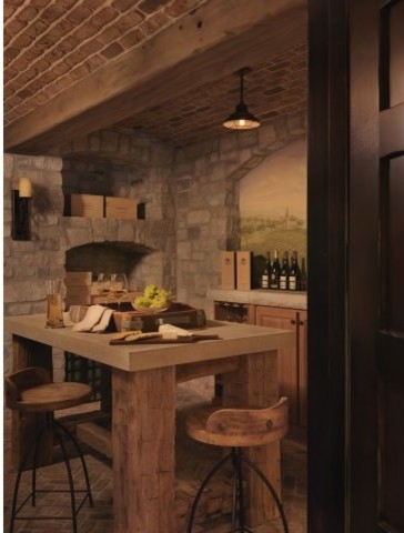 Enclosed dining room - mid-sized rustic brick floor enclosed dining room idea in St Louis with gray walls