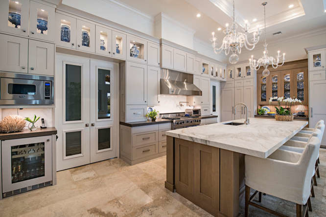 Mid-sized transitional l-shaped eat-in kitchen in Miami with an undermount sink, shaker cabinets, grey cabinets, marble benchtops, multi-coloured splashback, marble splashback, stainless steel appliances, travertine floors, with island and beige floor.