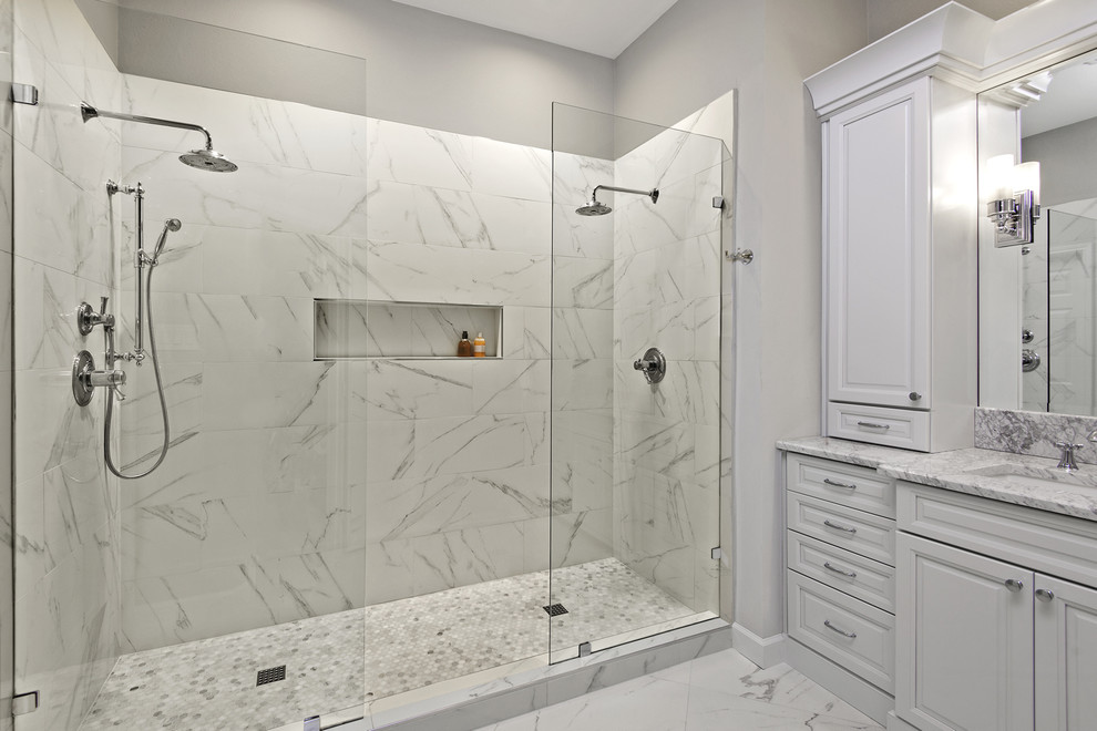 Design ideas for a large traditional master bathroom in Dallas with white cabinets, a double shower, white tile, porcelain tile, grey walls, porcelain floors, an undermount sink, granite benchtops, white floor, an open shower and raised-panel cabinets.
