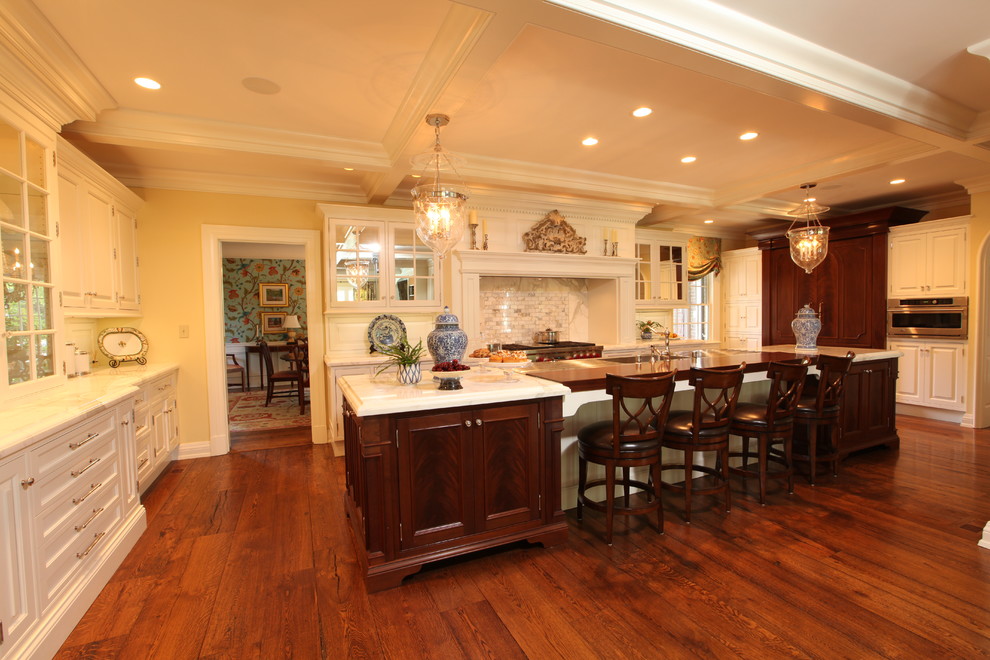 Photo of a traditional kitchen in Louisville with white cabinets.