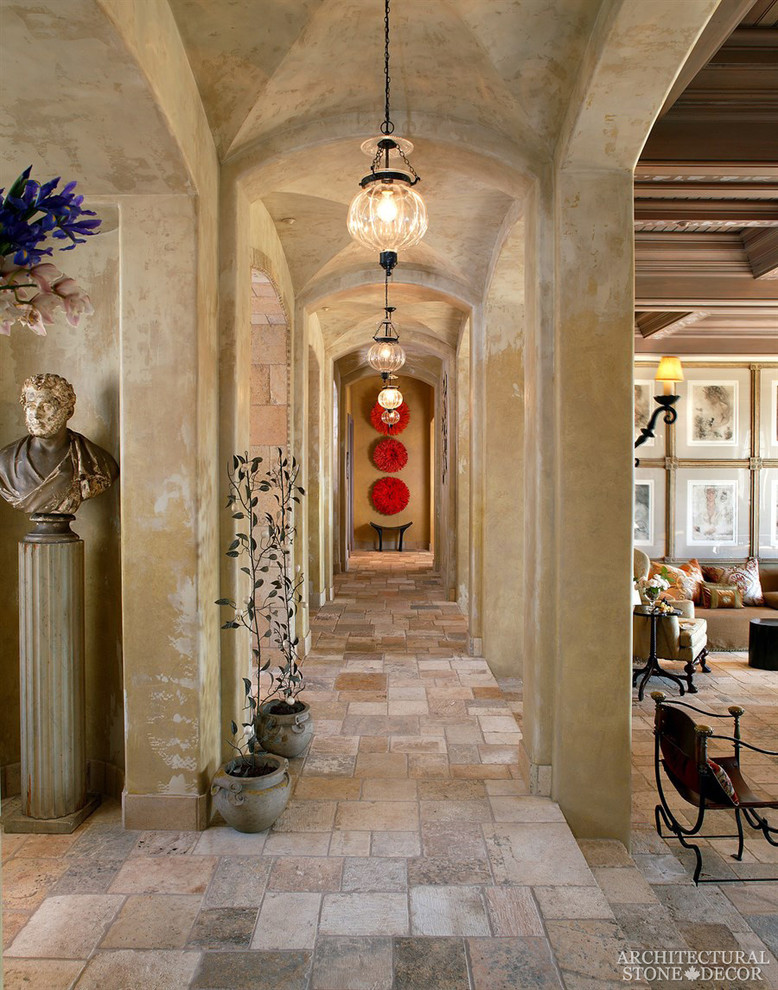 Inspiration for an expansive mediterranean hallway in Toronto with limestone floors.