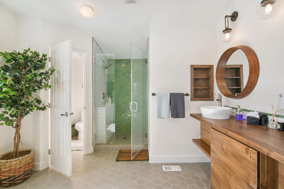 Example of an eclectic ceramic tile bathroom design in Los Angeles