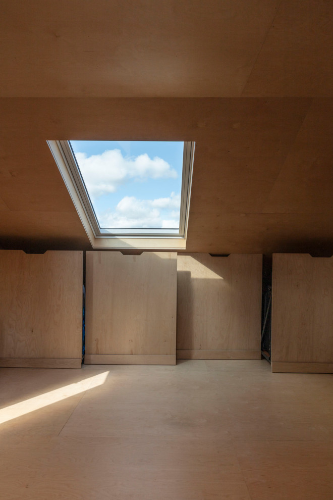 Inspiration for a medium sized scandi formal open plan living room feature wall in London with brown walls, plywood flooring, no fireplace, no tv, brown floors, a timber clad ceiling, panelled walls and a feature wall.