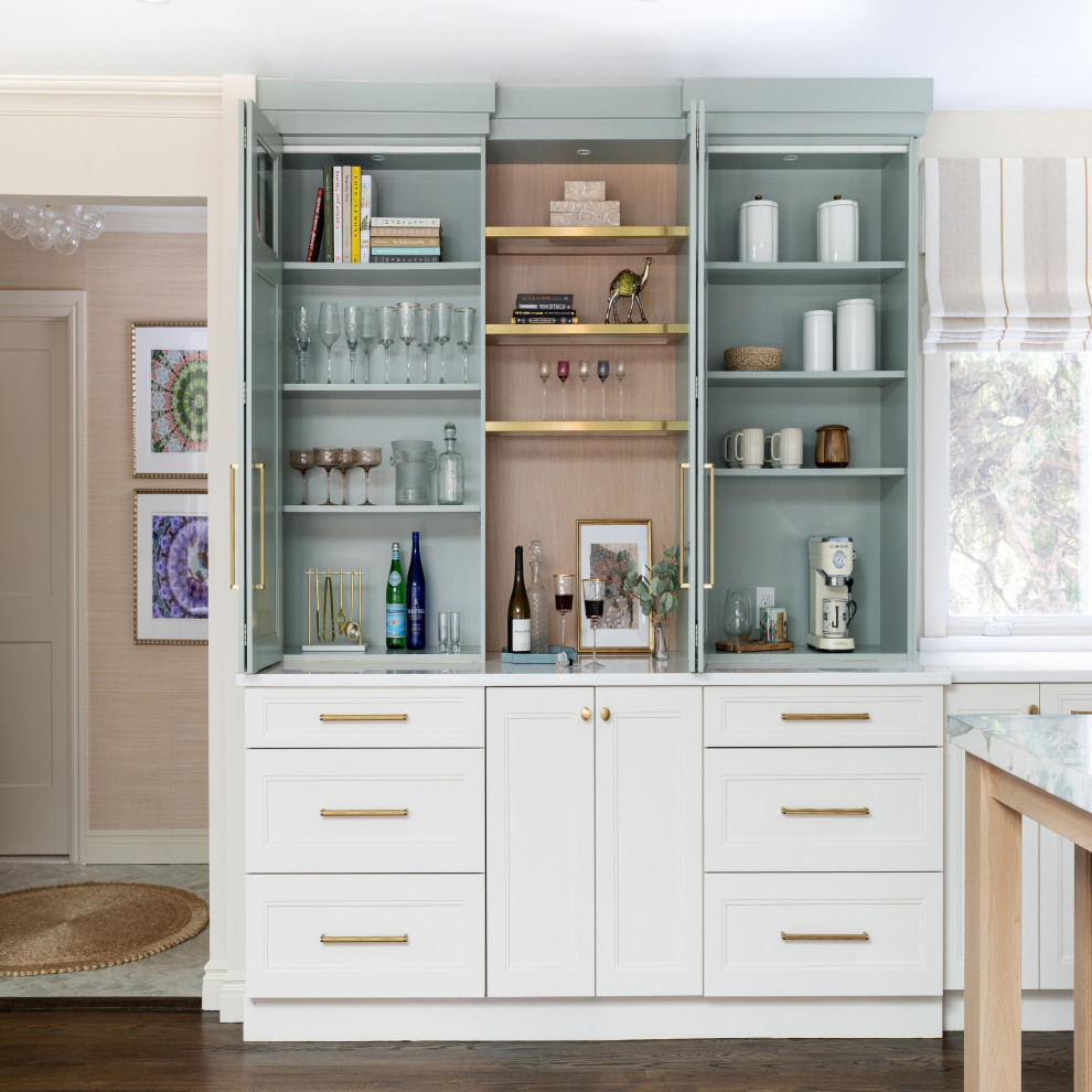 Enclosed kitchen - large transitional l-shaped dark wood floor and brown floor enclosed kitchen idea in New York with a farmhouse sink, recessed-panel cabinets, blue cabinets, marble countertops, white backsplash, stainless steel appliances, an island and white countertops