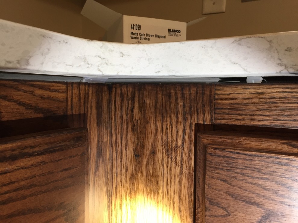 Gap between quartz countertop and