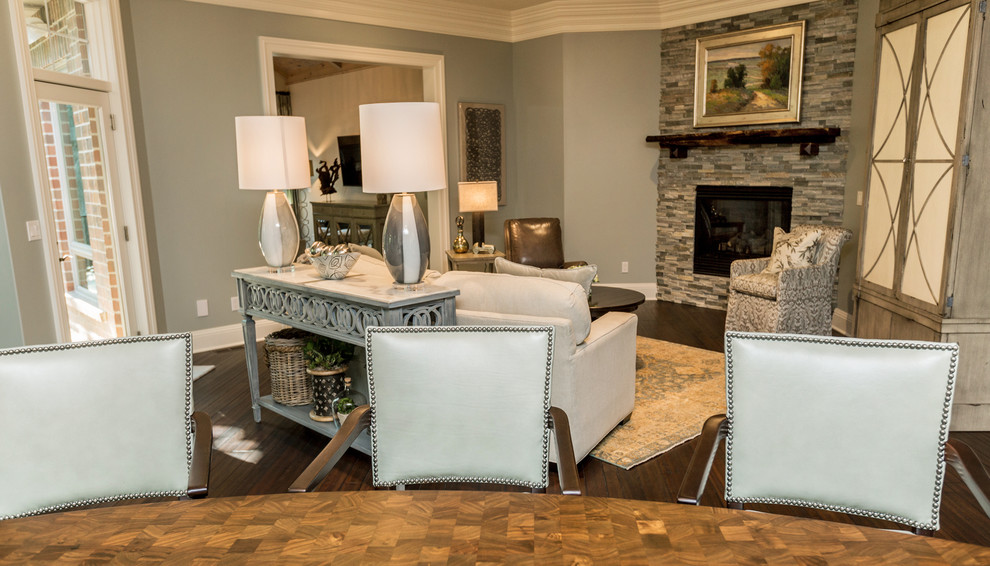 Example of a large transitional u-shaped dark wood floor eat-in kitchen design with a farmhouse sink, shaker cabinets, white cabinets, marble countertops, gray backsplash, subway tile backsplash, stainless steel appliances and two islands