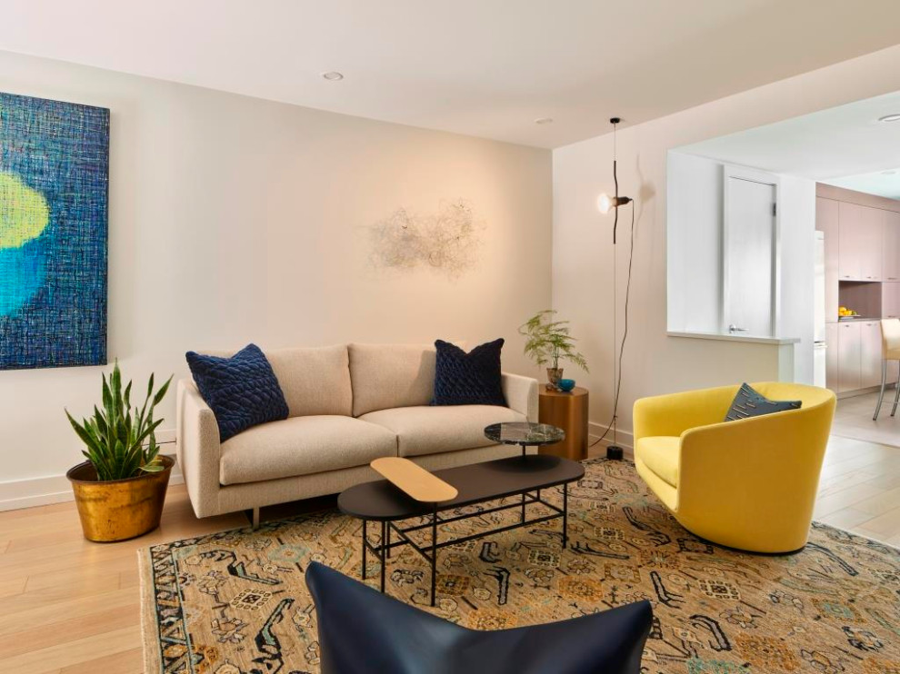 Design ideas for a small modern living room in Philadelphia with white walls, light hardwood floors and beige floor.