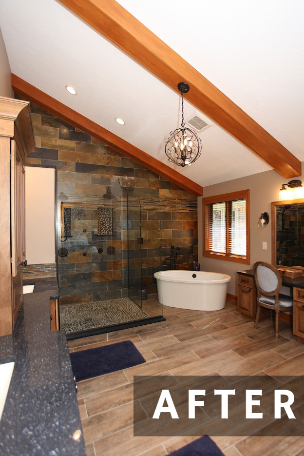 Large mountain style master slate tile brown floor freestanding bathtub photo in Indianapolis with brown cabinets, beige walls and an undermount sink