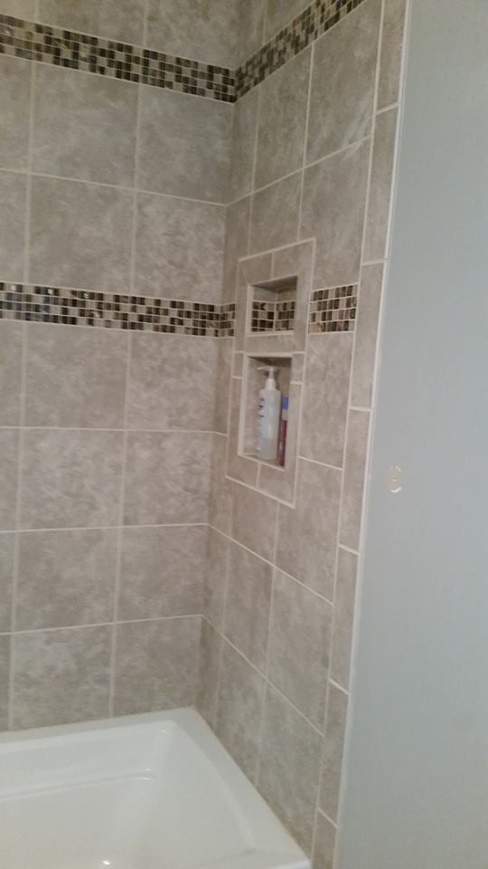Photo of a small traditional 3/4 bathroom in Salt Lake City with an alcove tub, a shower/bathtub combo, beige tile and ceramic tile.
