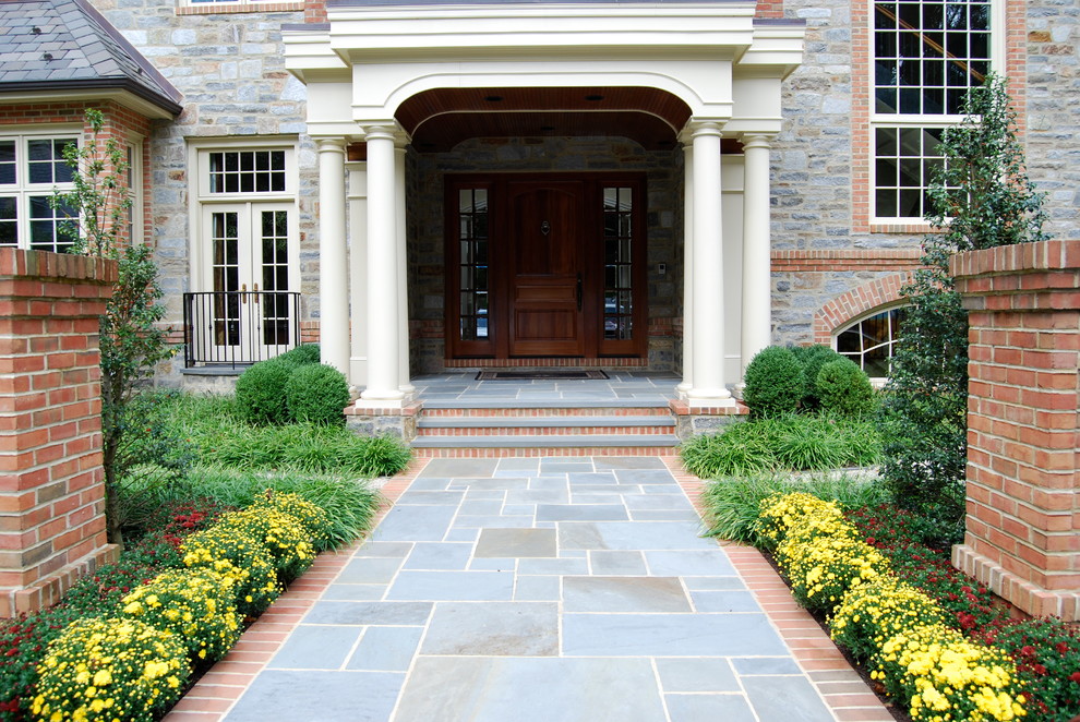 Inspiration for a traditional front door in Philadelphia with a single front door and a medium wood front door.