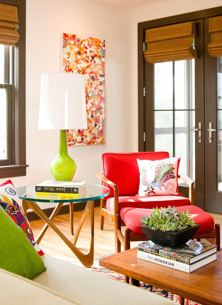 Photo of a midcentury living room in Boston with medium hardwood floors.