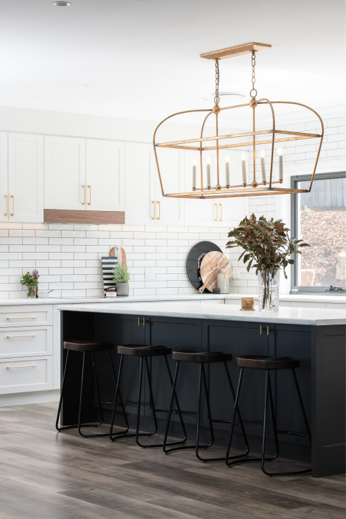 Charming Farmhouse Vibes: Black and White Kitchen with Traditional White Subway Tiles