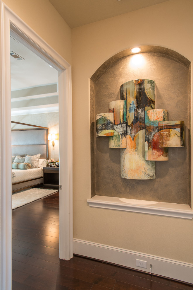 Large transitional dark wood floor and brown floor hallway photo with beige walls