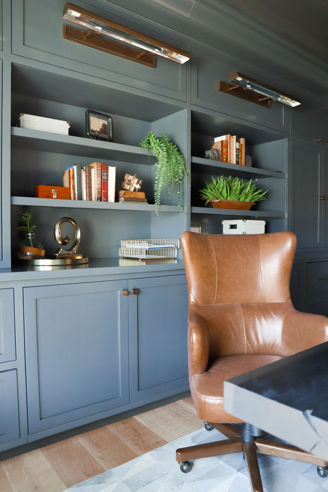 Example of a transitional home office design in Phoenix