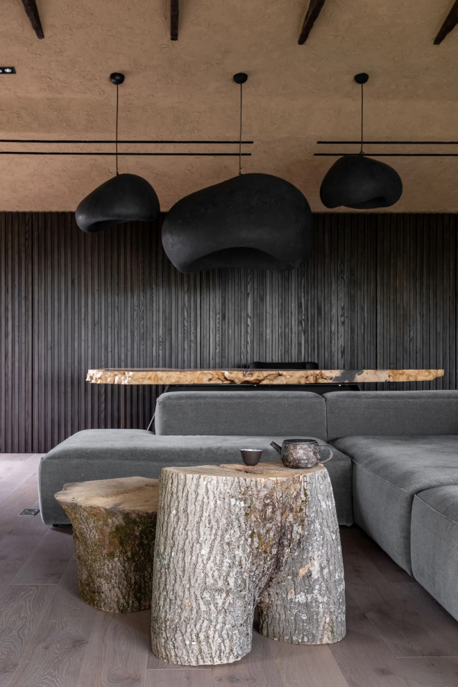 Foto di un soggiorno minimalista di medie dimensioni con pavimento in legno massello medio