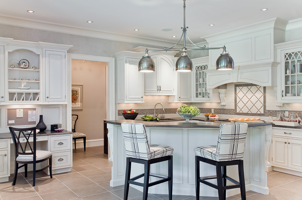 Traditional kitchen in Boston with beaded inset cabinets, white cabinets and multi-coloured splashback.