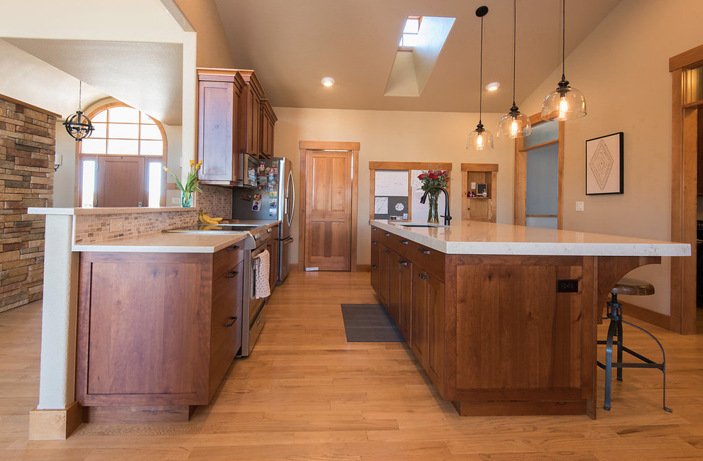 Example of a transitional kitchen design in Denver