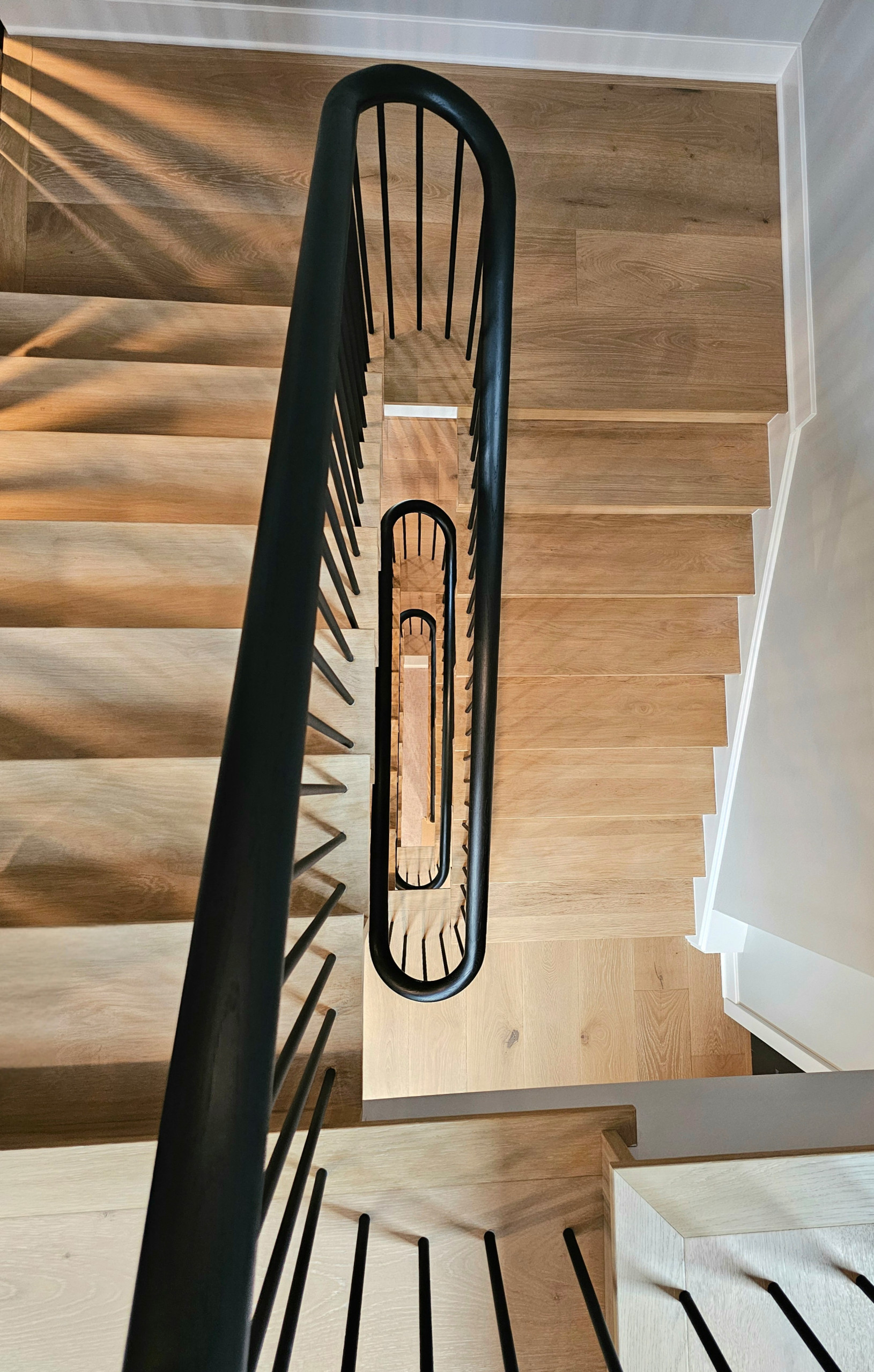 115_Stunning Continuous Rail System on 3 Story Floating Stairs; Arlington, VA 22