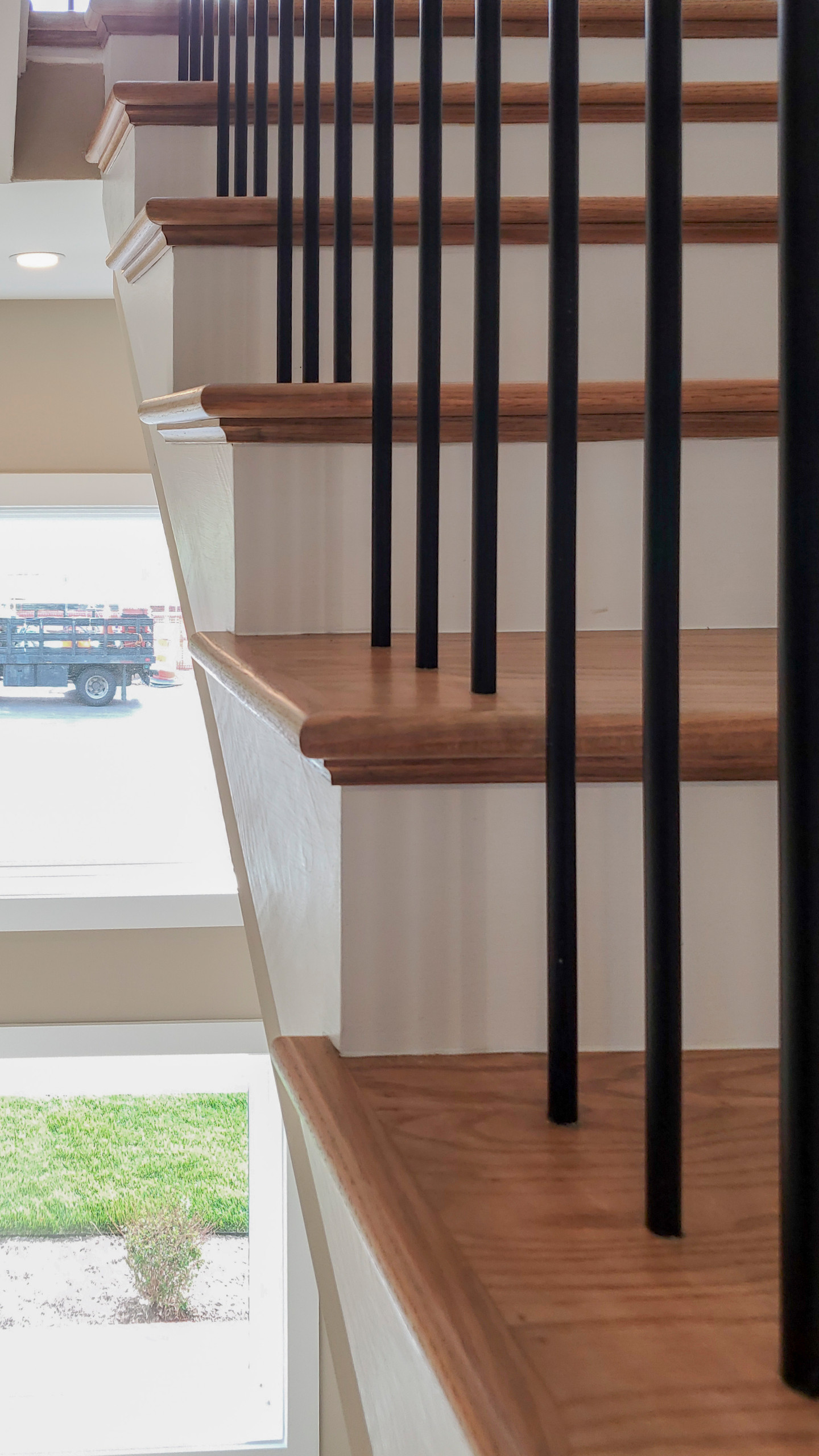 Project #153 | Sophisticated Red Oak Stair with Metal Balusters