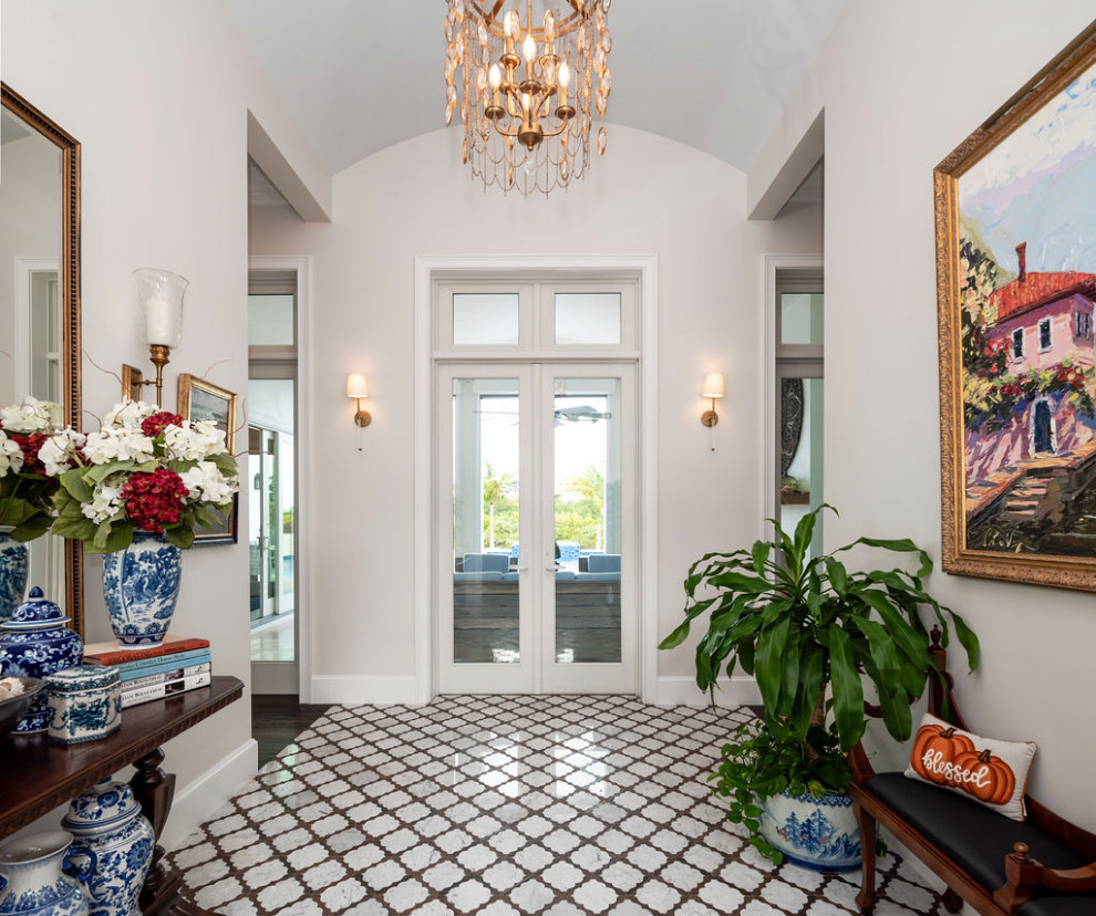 Large transitional foyer in Other with white walls, marble floors, a double front door, a white front door and white floor.