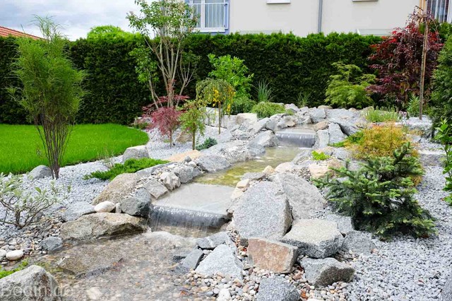 Gartenumgestaltung mit Bachlauf garden