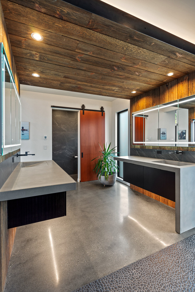 Inspiration för stora moderna grått en-suite badrum, med släta luckor, svarta skåp, en kantlös dusch, grå kakel, porslinskakel, betonggolv, ett integrerad handfat, bänkskiva i betong, grått golv och med dusch som är öppen