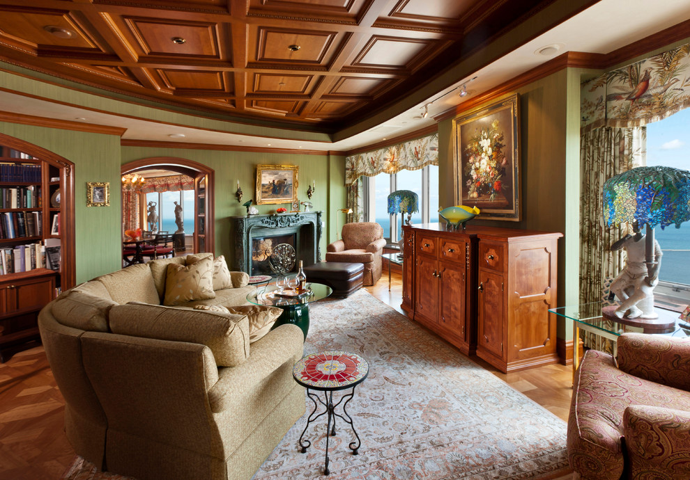 Traditional formal open concept living room in Milwaukee with medium hardwood floors and a metal fireplace surround.