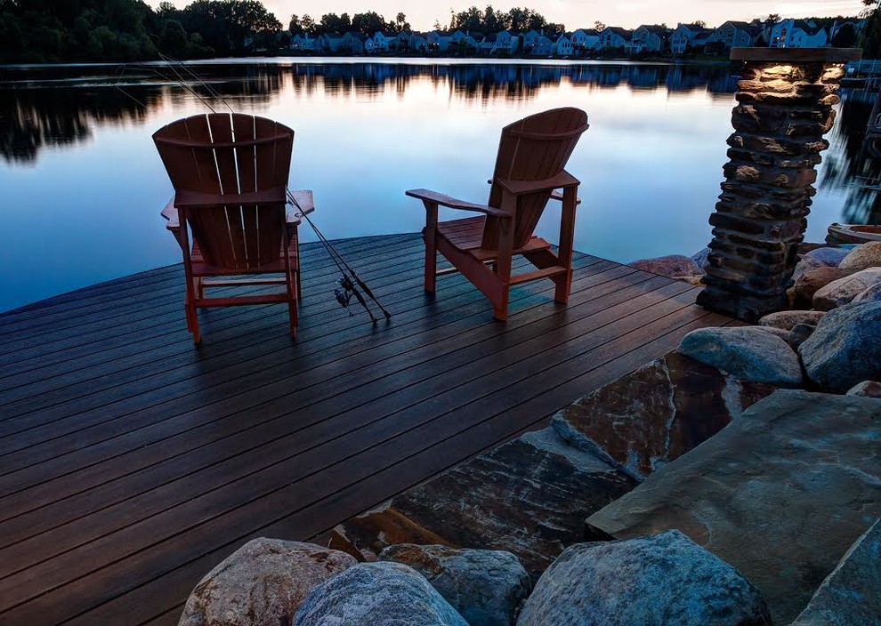 Design ideas for a small country backyard deck in Cleveland with with dock and no cover.