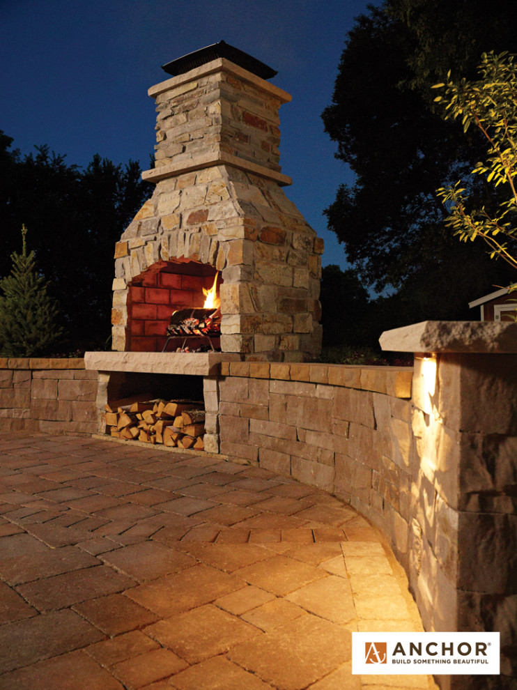 Inspiration for a mid-sized timeless patio remodel in Minneapolis with a fireplace