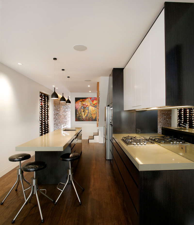 Design ideas for a small contemporary galley eat-in kitchen in Sydney.